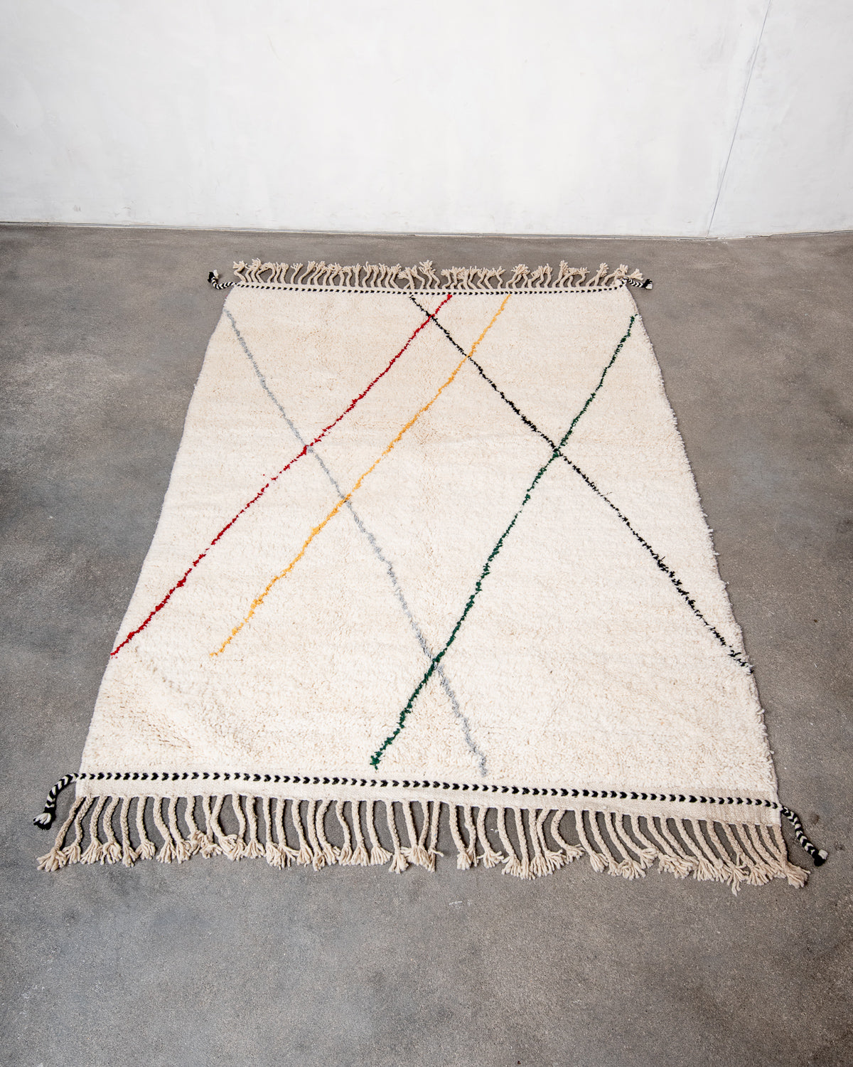 Modern, designer, handcrafted Berber rug from Morocco. Beniourain carpet with beautiful colours and patterns and fluffy wool texture.